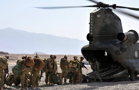 Australian troupes boarding a helicopter